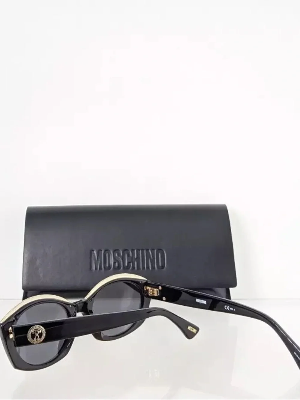 Moschino Black and Gold Cat Eye Sunglasses